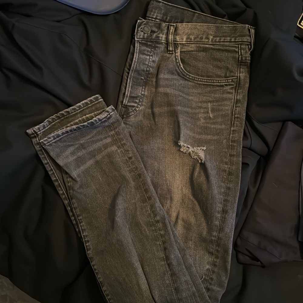 Blacked ripped jeans